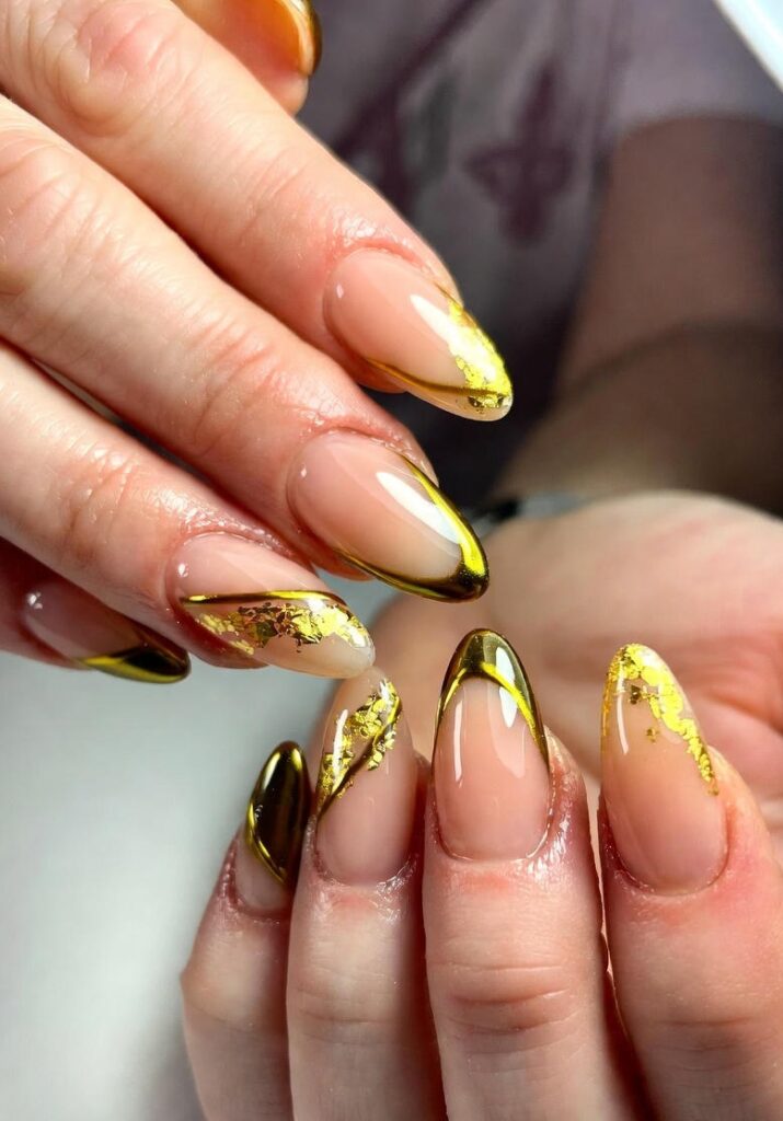 Top Almond Nails Ideas for 2025: Simple to Glam Designs 5 Gold Accent Glam Almond Nails Ideas