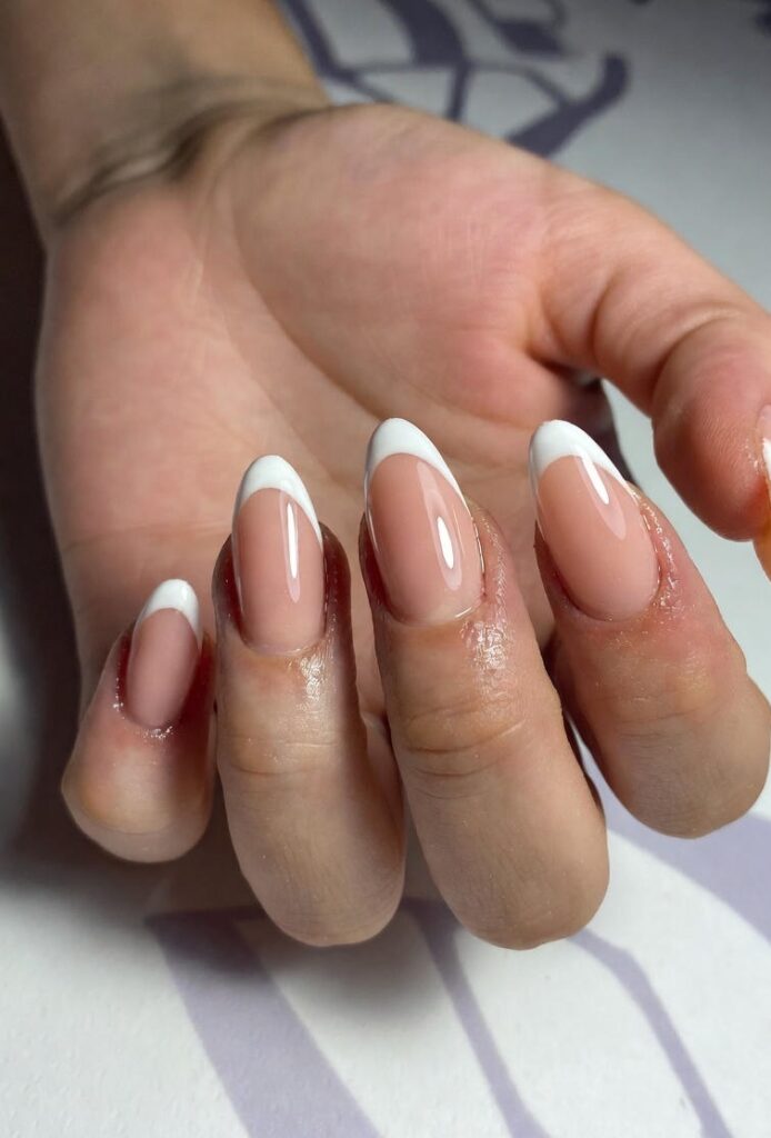 Top Almond Nails Ideas for 2025: Simple to Glam Designs 1 Minimalist White Tips Almond Nails Ideas