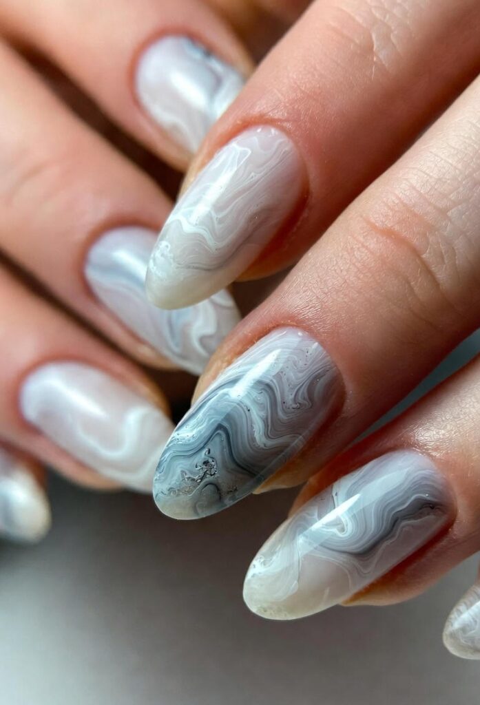 Top Almond Nails Ideas for 2025: Simple to Glam Designs 11 Marble Swirl Luxury Almond Nails Ideas