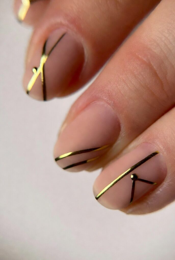 Nude Gold Luxury Nails with Minimalist Nail Art Designs